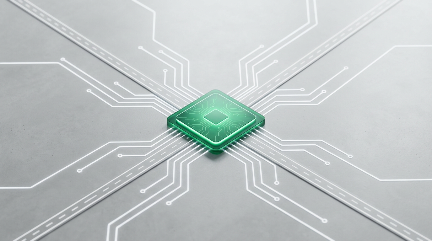 Chip informático estilizado brillando sobre una superficie de concreto, con líneas de carretera que salen de él como circuitos.